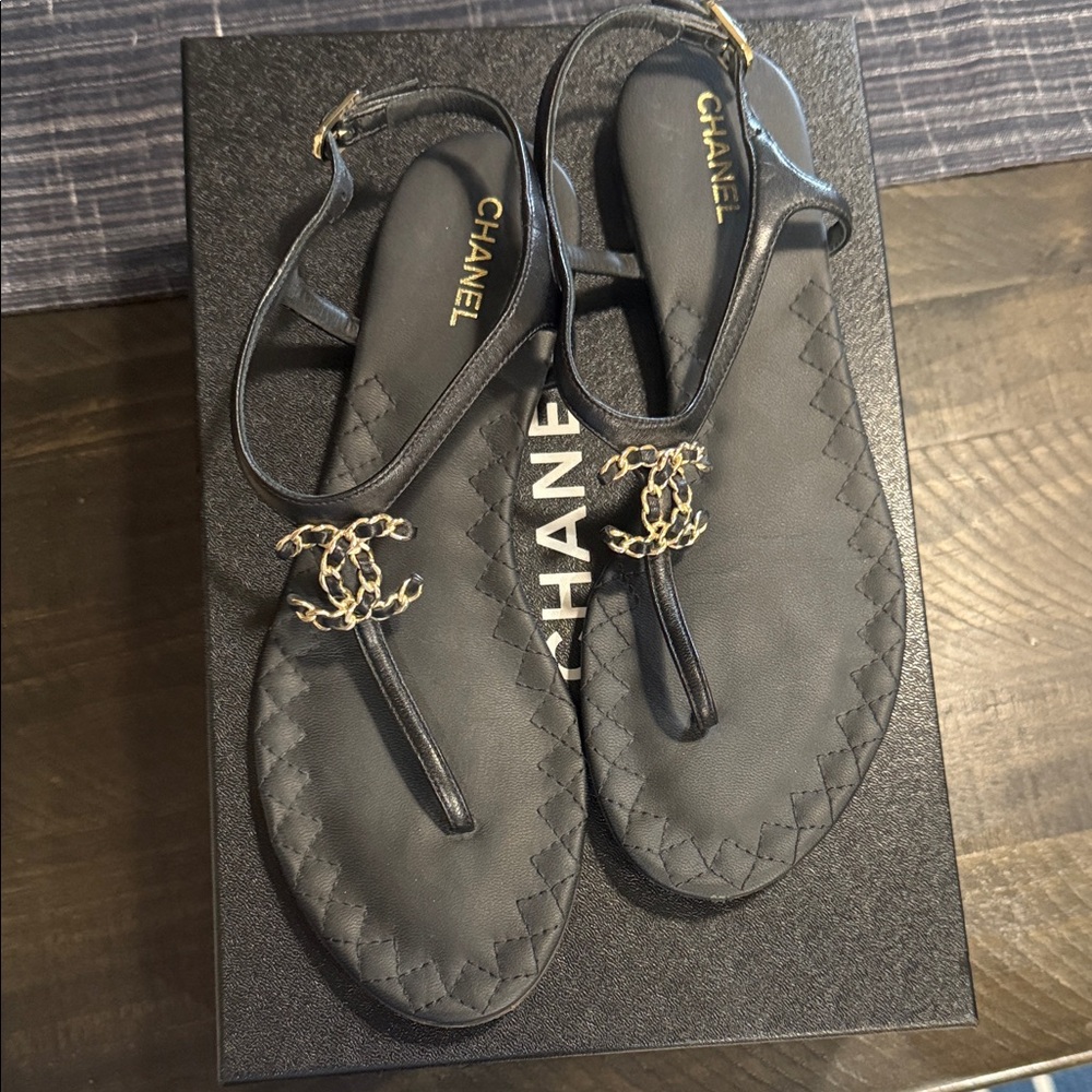 CHANEL Black Leather Sandals with Gold Accents